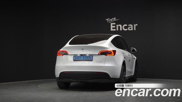 Tesla Model Y 2024 — photo 4