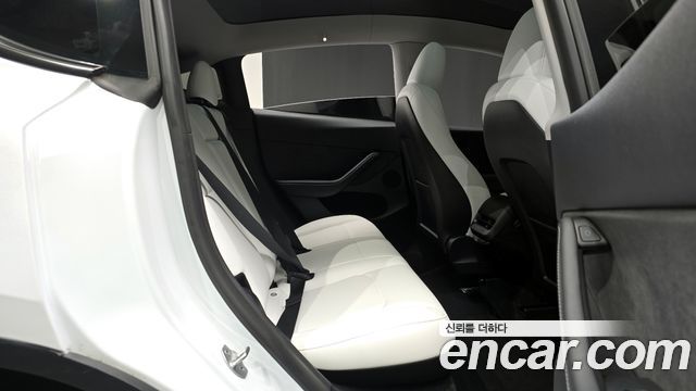 Tesla Model Y 2024 — photo 12