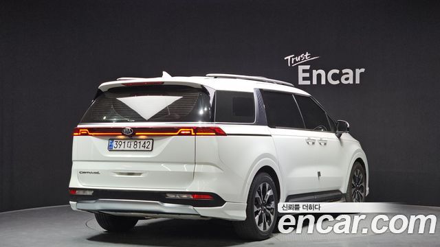 Kia Canival 2021 — photo 2