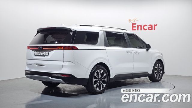Kia Canival 2021 — photo 2