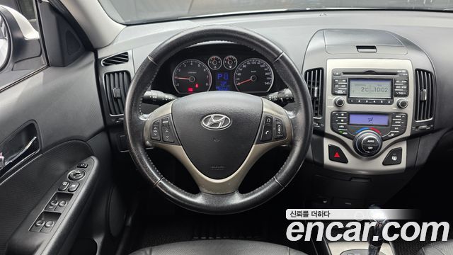 Hyundai i30 2009 — photo 13