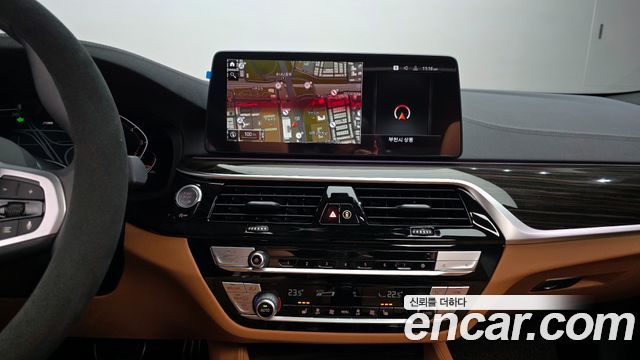BMW 5-Series 2021 — photo 14