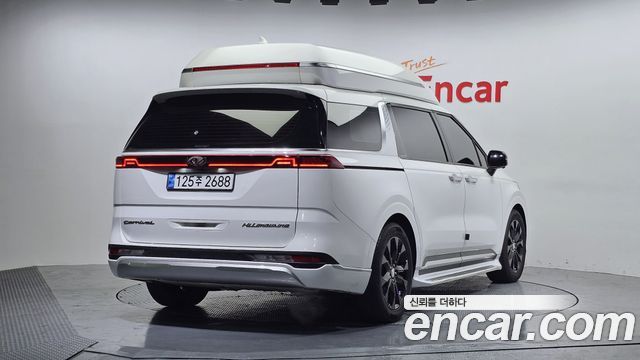 Kia Canival 2021 — photo 2