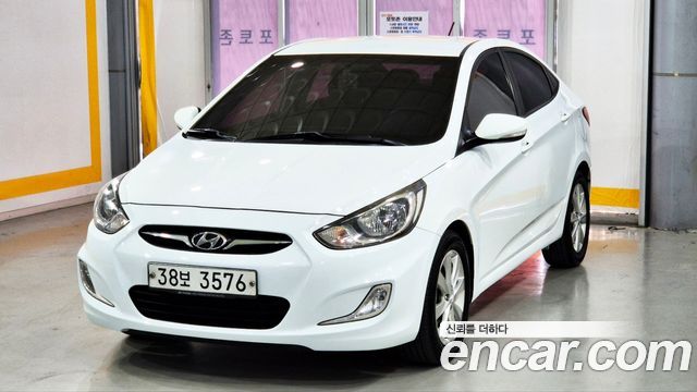 Hyundai Accent 2013 — photo 1