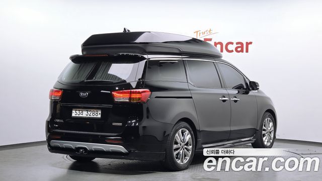 Kia Canival 2015 — photo 2
