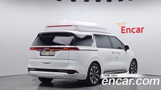 Kia Canival 2023 — photo 2