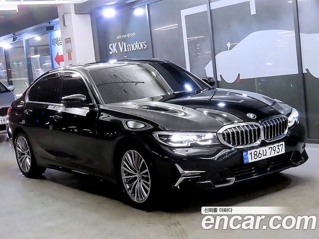 BMW 3-Series 2022 — photo 1