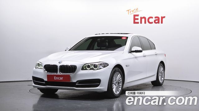 BMW 5-Series 2014 — photo 1