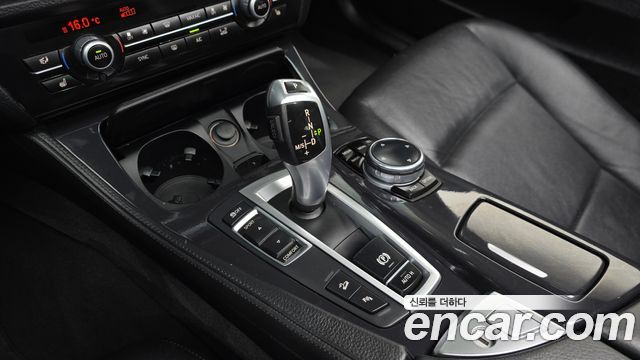 BMW 5-Series 2014 — photo 9