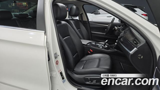 BMW 5-Series 2014 — photo 10