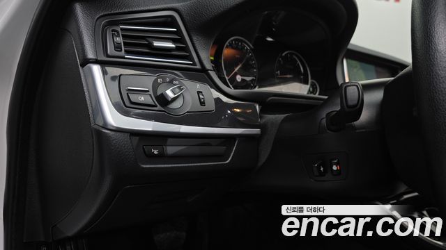 BMW 5-Series 2014 — photo 14