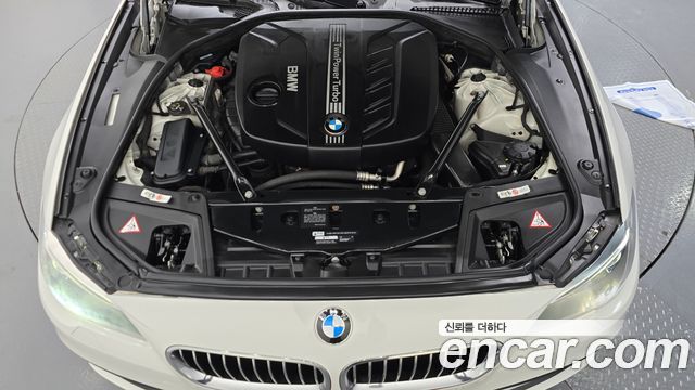 BMW 5-Series 2014 — photo 18