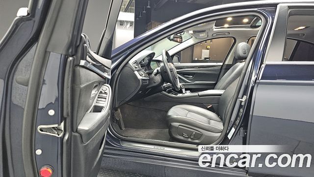 BMW 5-Series 2014 — photo 10