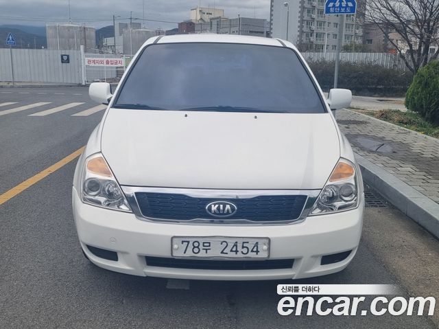 Kia Canival 2009 — photo 2