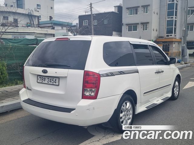 Kia Canival 2009 — photo 4