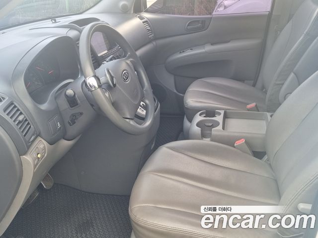 Kia Canival 2009 — photo 6