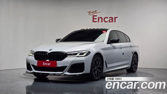 BMW 5-Series 2022 — photo 1
