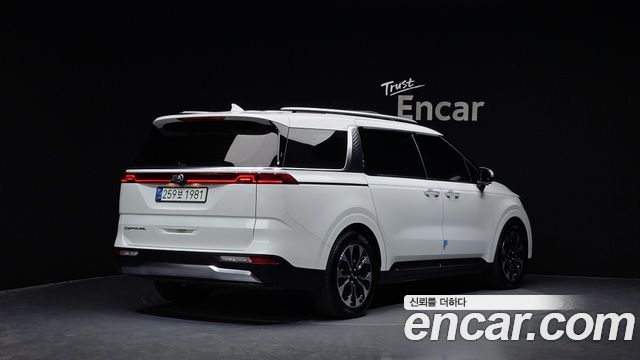 Kia Canival 2021 — photo 2