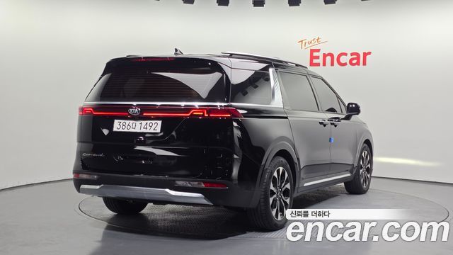 Kia Canival 2021 — photo 2