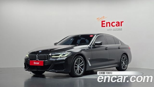 BMW 5-Series 2021 — photo 1