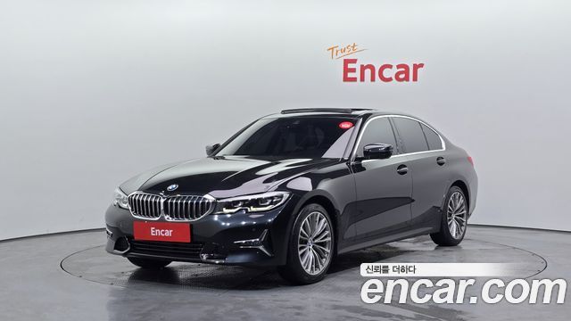 BMW 3-Series 2022 — photo 1