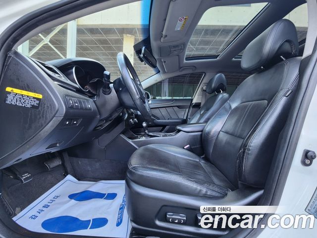 Kia K7 2012 — photo 11