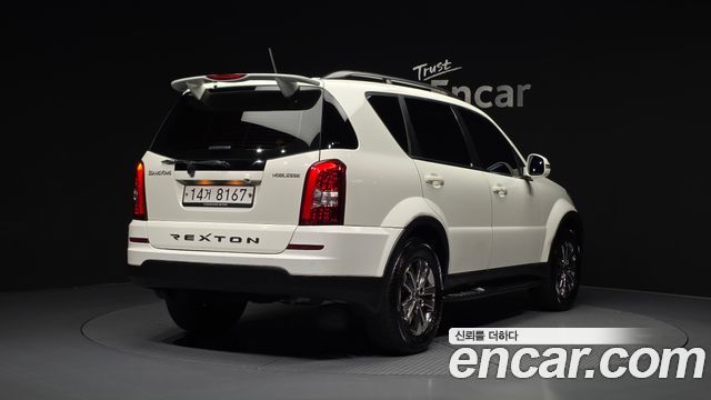KG Mobility Rexton 2014 — photo 2
