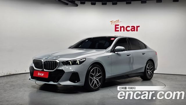 BMW 5-Series 2024 — photo 1