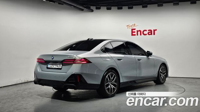 BMW 5-Series 2024 — photo 2