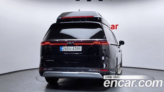 Kia Canival 2022 — photo 2