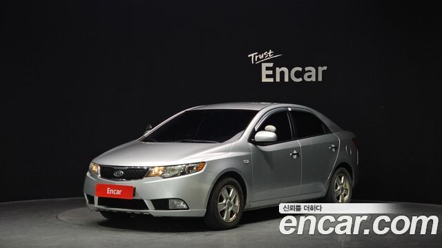 Kia Porte 2012 — photo 1