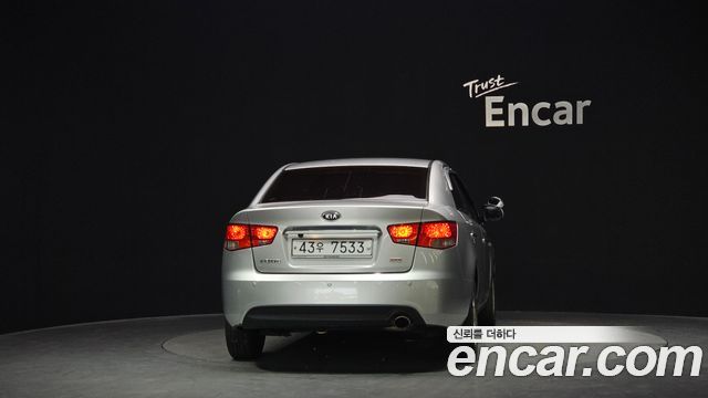 Kia Porte 2012 — photo 4