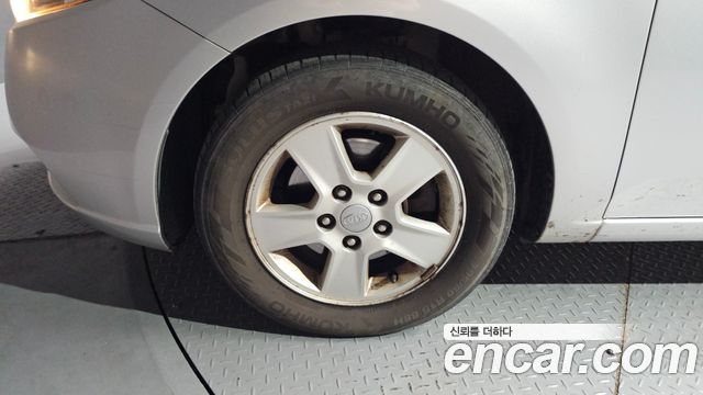 Kia Porte 2012 — photo 5