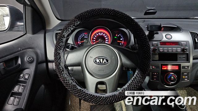 Kia Porte 2012 — photo 12