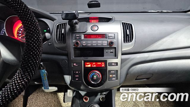 Kia Porte 2012 — photo 13