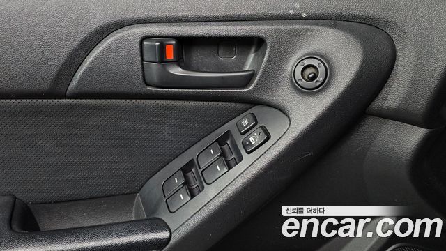 Kia Porte 2012 — photo 19