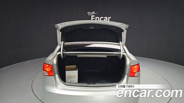 Kia Porte 2012 — photo 20