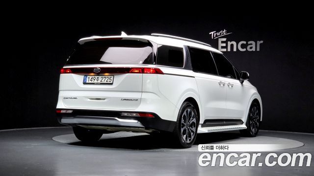 Kia Canival 2021 — photo 2