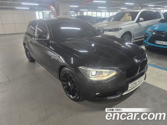 BMW 1-Series 2013 — photo 1