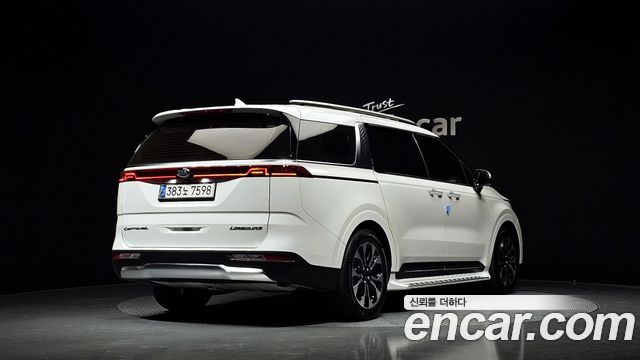 Kia Canival 2021 — photo 2