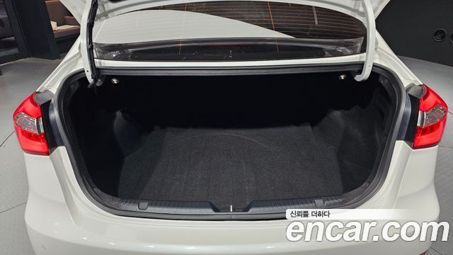 Kia K3 2014 — photo 16