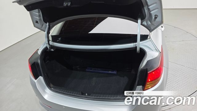Kia K5 2011 — photo 26