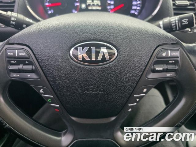 Kia K3 2015 — photo 15