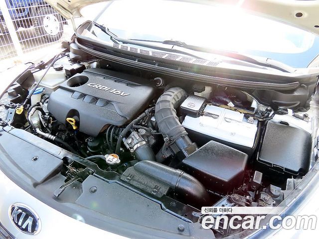 Kia K3 2014 — photo 17