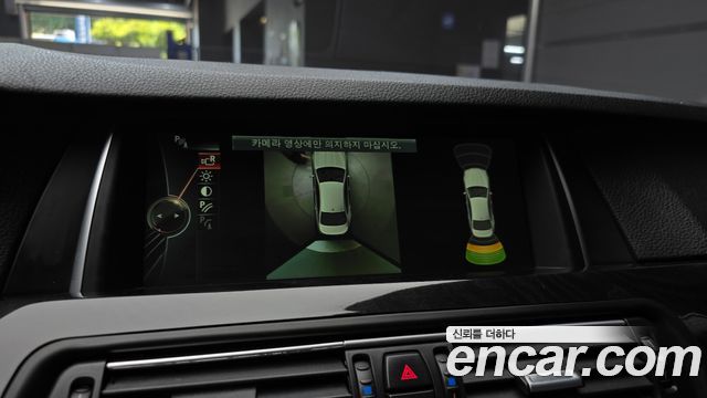 BMW 5-Series 2014 — photo 14