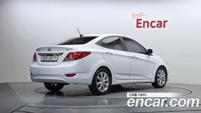 Hyundai Accent 2013 — photo 2