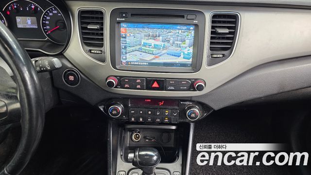 Kia Carens 2014 — photo 14
