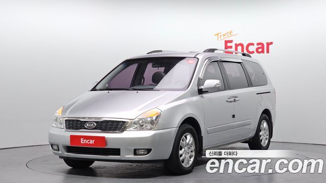 Kia Canival 2012 — photo 1