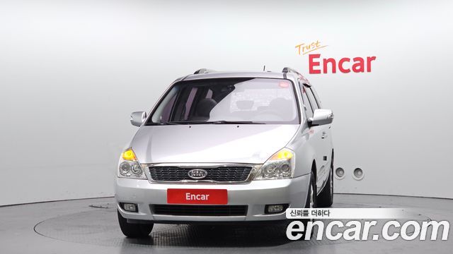 Kia Canival 2012 — photo 3
