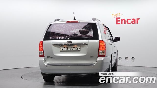 Kia Canival 2012 — photo 4